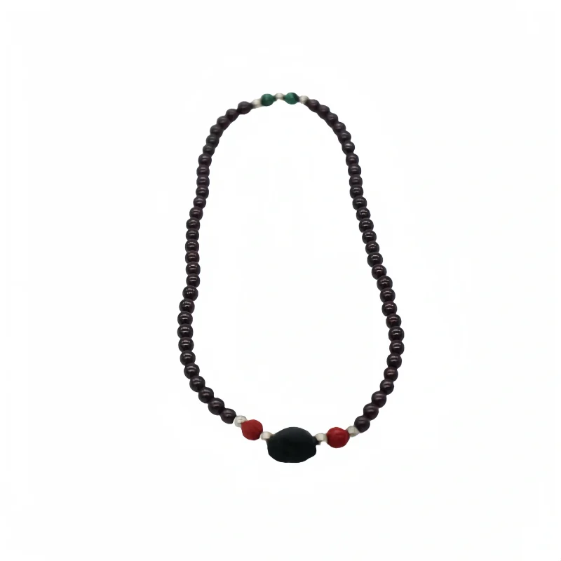 Garnet and Obsidian Manjushri with spacer beads long bracelet