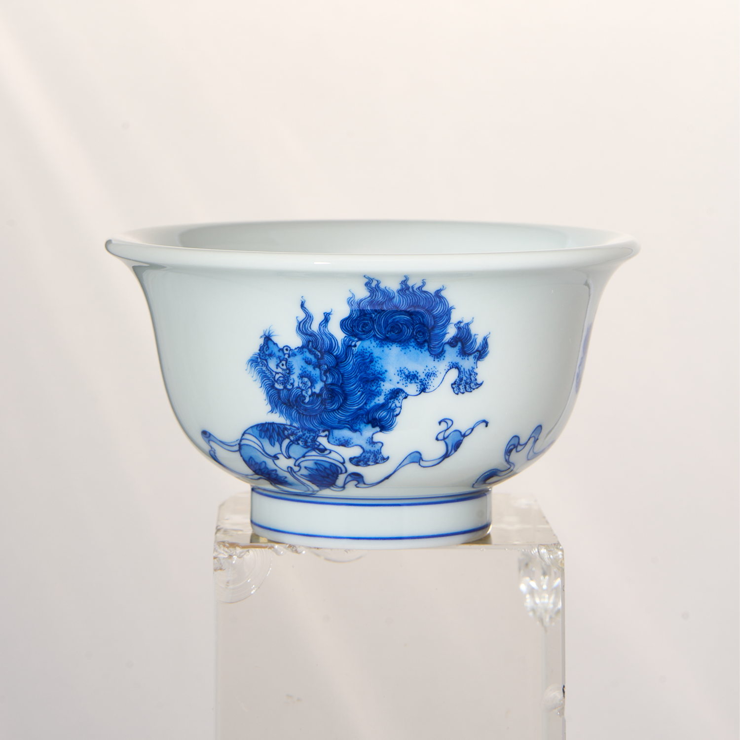 Blue and White Lion and Embroidered Ball Pressed Hand Cup