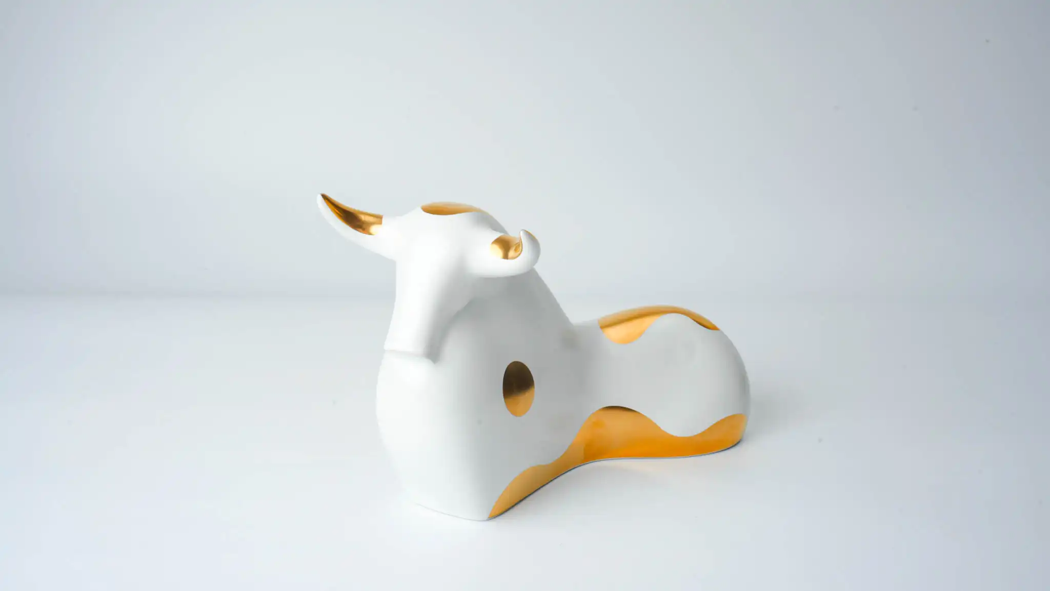 Female Reclining Ox Ceramic Figurine White